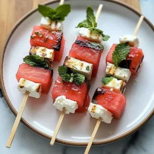 Watermelon feta mint skewers arranged on a platter for a fresh appetizer
